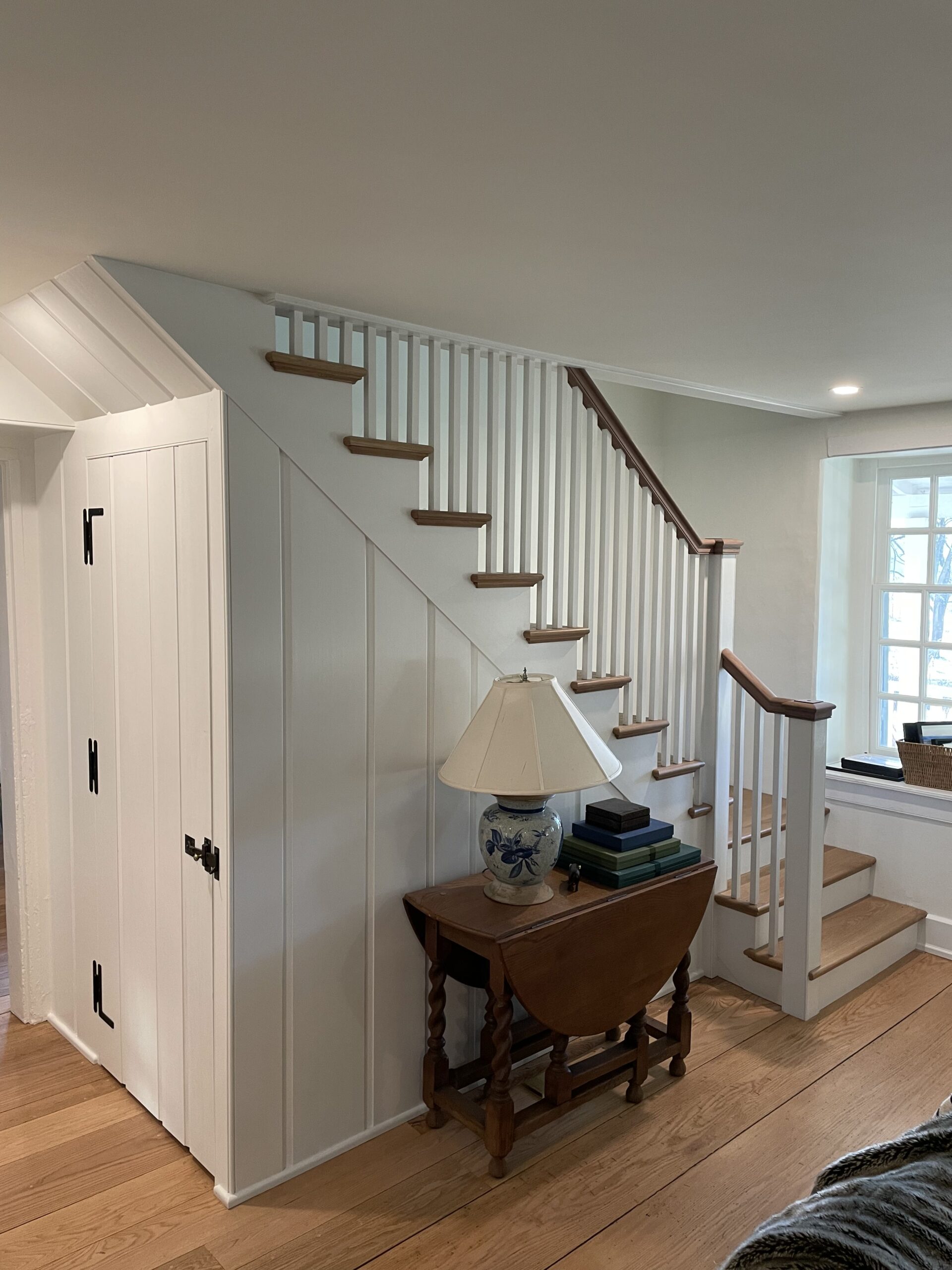 A classic, white stairway in a home built in Kennet Square, PA.